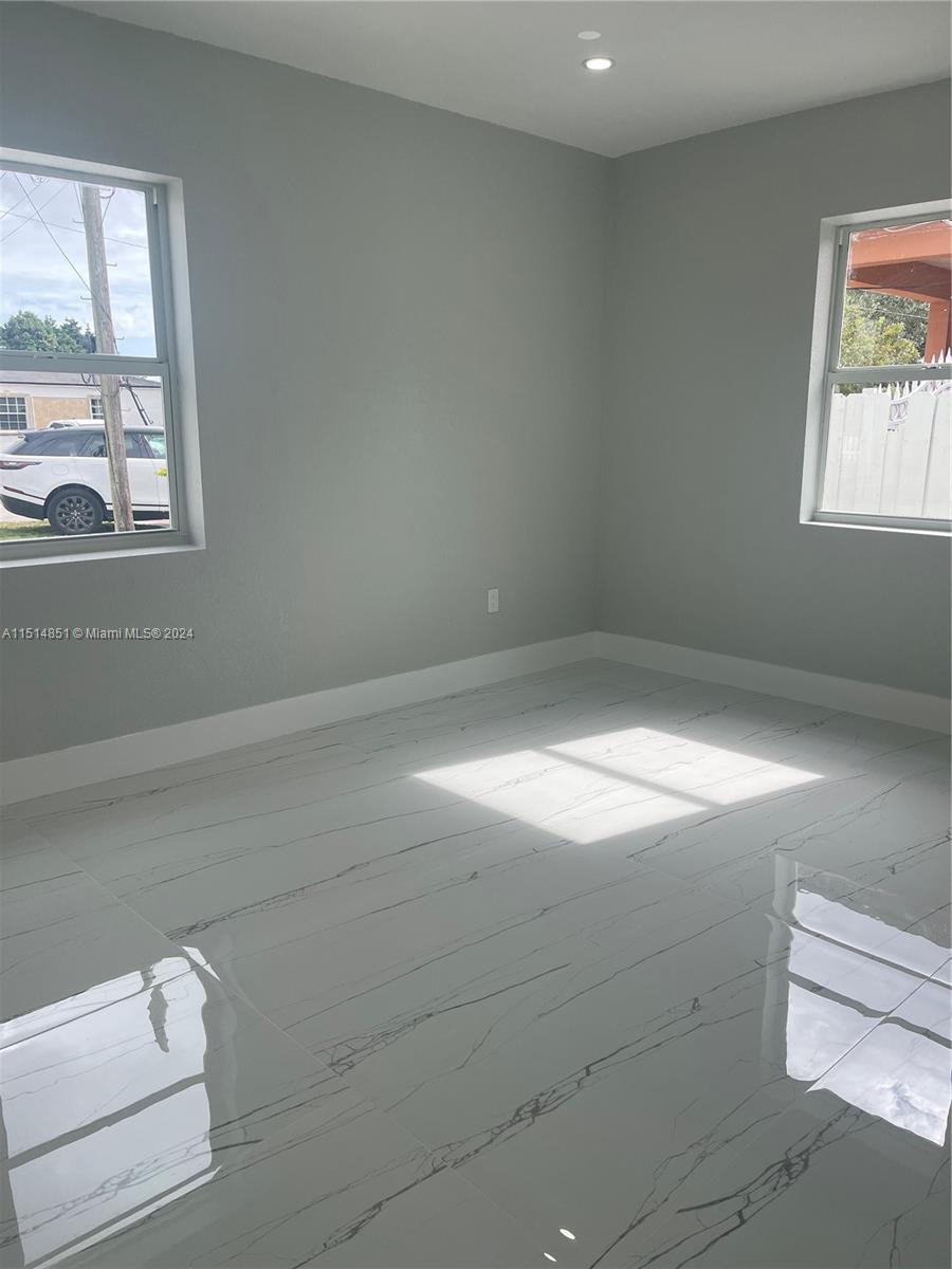 516 Southwest 66th Avenue Miami, FL 33144 - Photo 27 of 27 a bathroom with a window