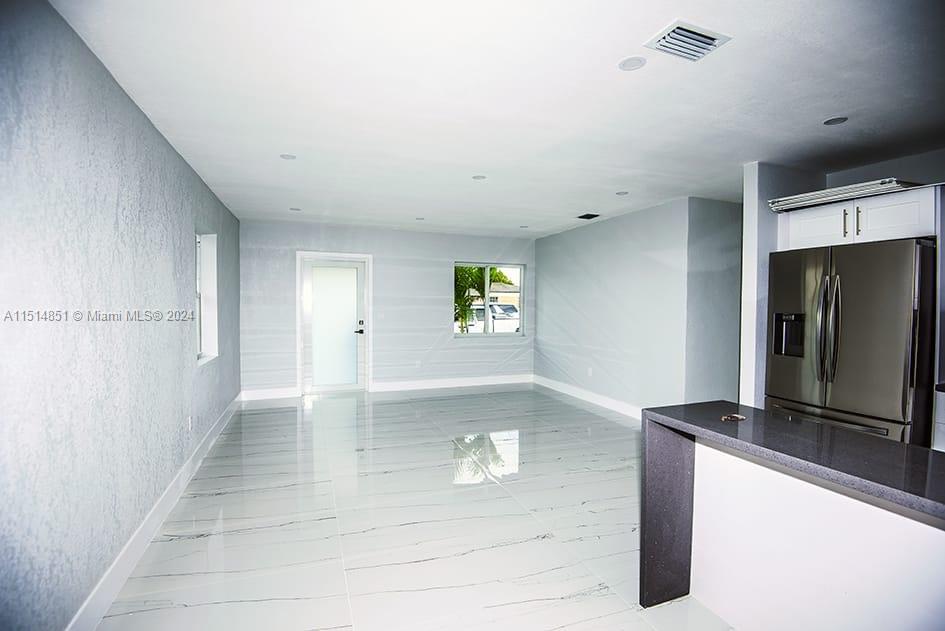516 Southwest 66th Avenue Miami, FL 33144 - Photo 4 of 27 a view of an empty room