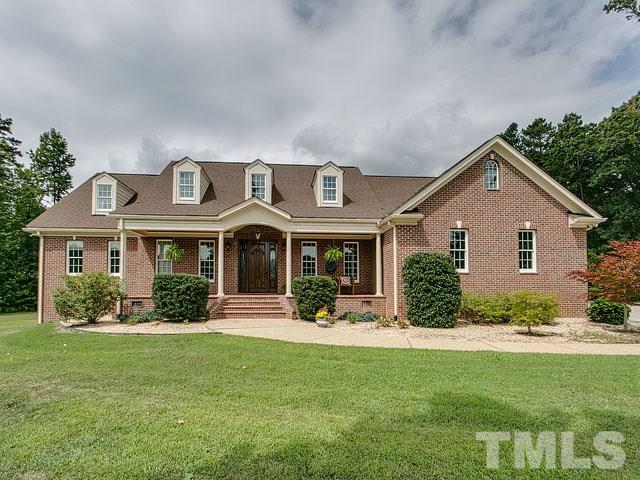 1378 Bowen Road Rougemont, NC 27572 - Photo 1 of 25 a front view of a house with porch