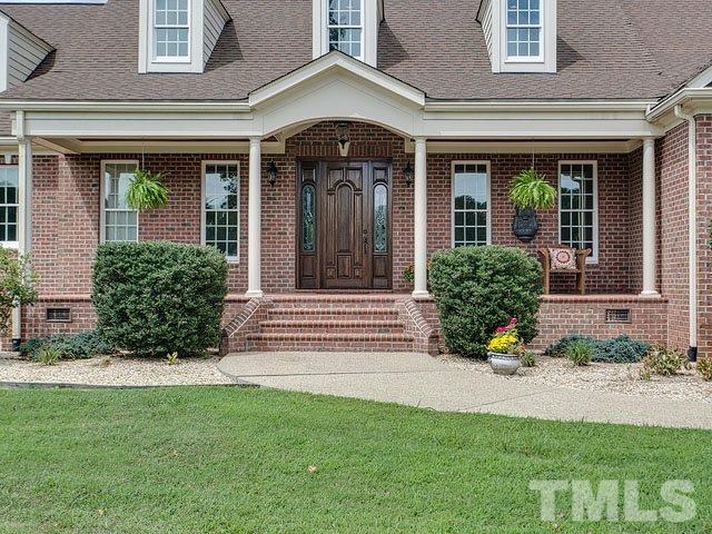 1378 Bowen Road Rougemont, NC 27572 - Photo 3 of 25 a front view of a house with a yard