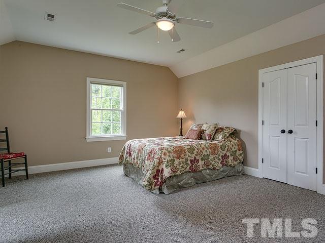 1378 Bowen Road Rougemont, NC 27572 - Photo 23 of 25 a bedroom with a bed and a window