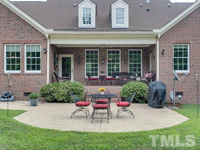 1378 Bowen Road Rougemont, NC 27572 - Photo 4 of 25 a house view with a seating space and garden