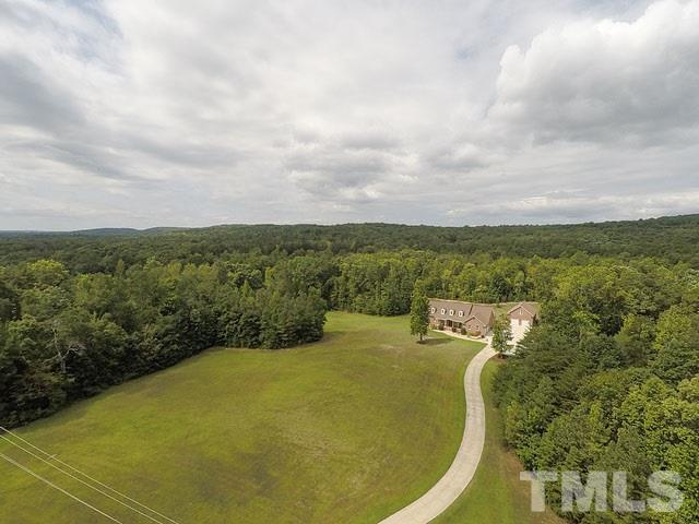 1378 Bowen Road Rougemont, NC 27572 - Photo 5 of 25 a view of a swimming pool and lake view