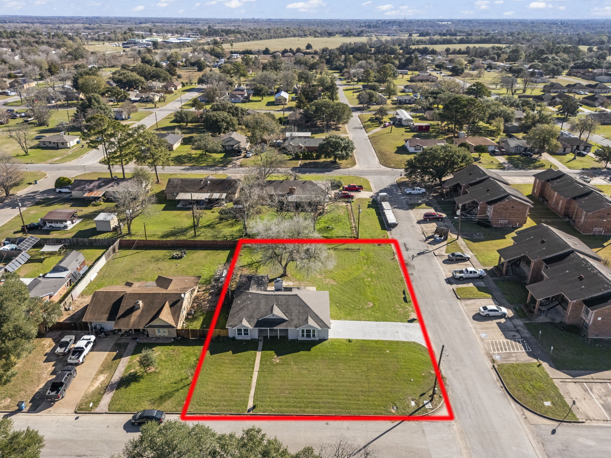 1740 6th Street Hempstead, TX 77445 - Photo 3 of 21 an aerial view of residential houses with outdoor space