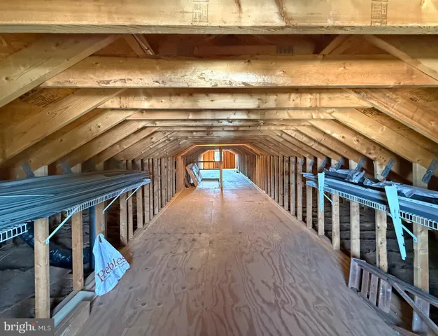 a view of a balcony with wooden floor
