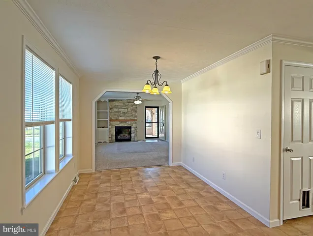 a front view of a house with a porch