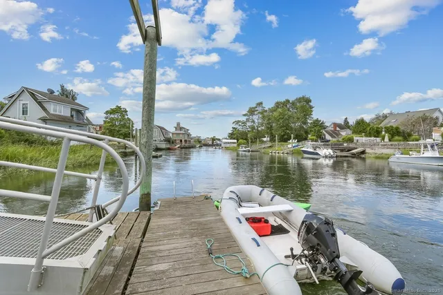 a lake view with a wooden bridge and lake view