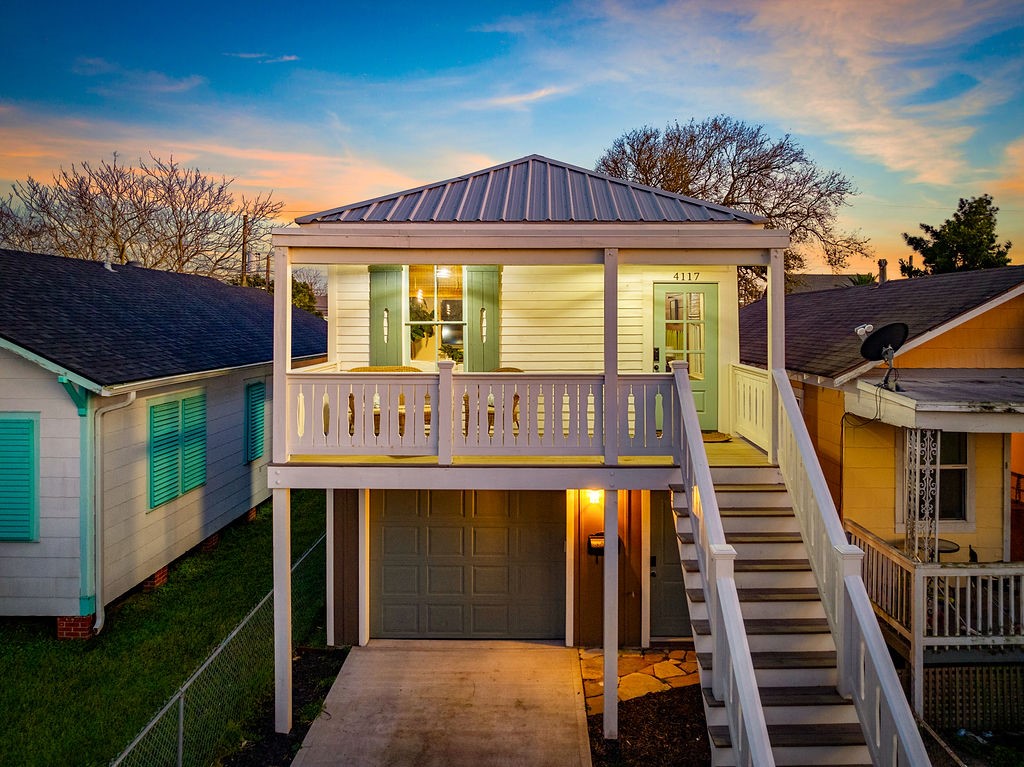 4117 Avenue R Galveston, TX 77550 - Photo 2 of 39 a view of a house with wooden deck