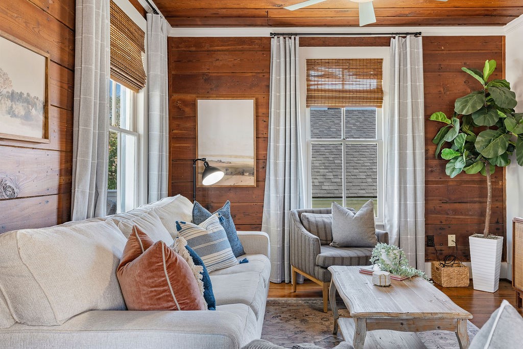 4117 Avenue R Galveston, TX 77550 - Photo 6 of 39 a living room with furniture and a potted plant