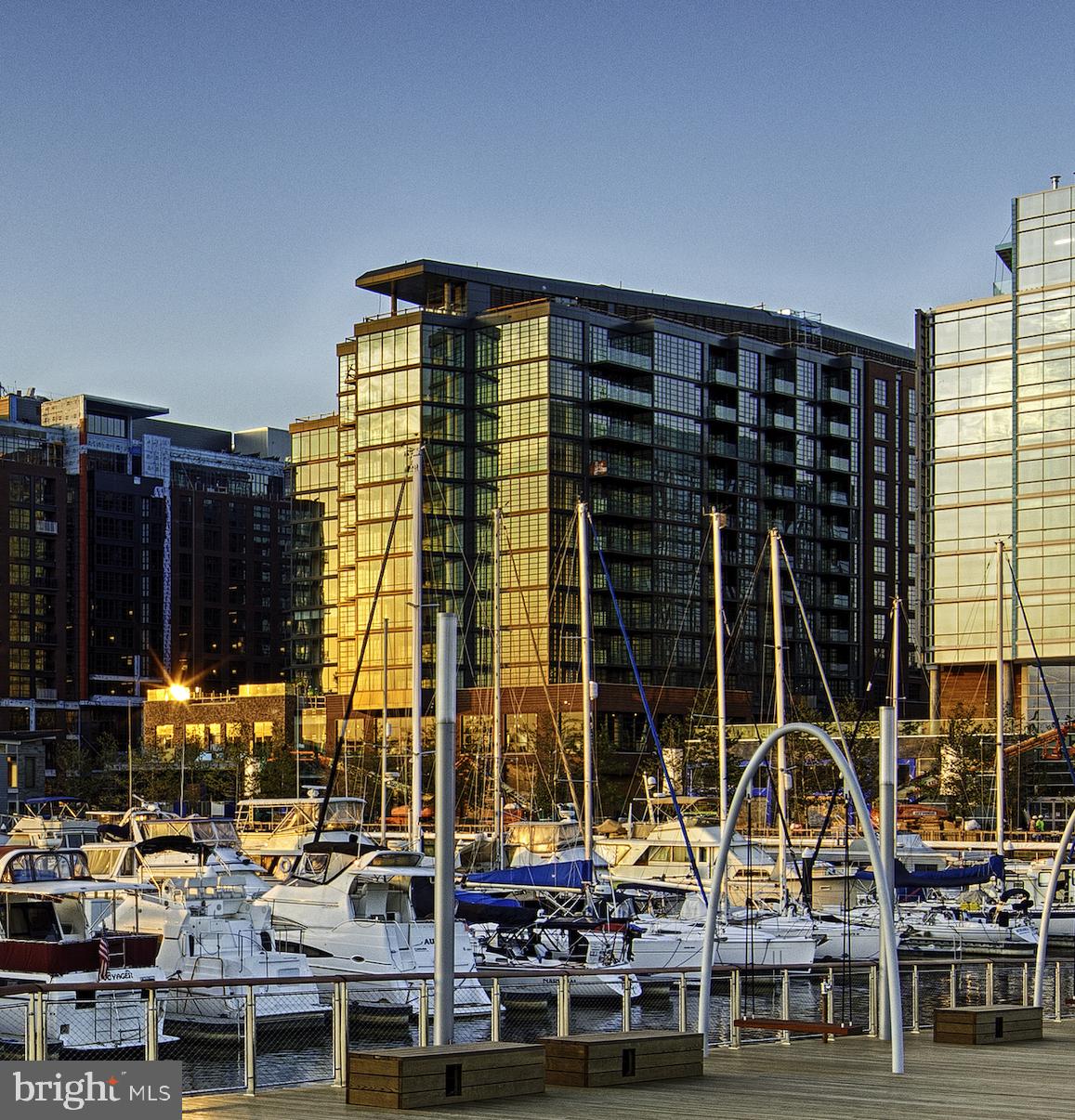 45 Sutton Square Southwest, Unit 1115 Washington, DC 20024 - Photo 1 of 14 a front view of a building with glass door