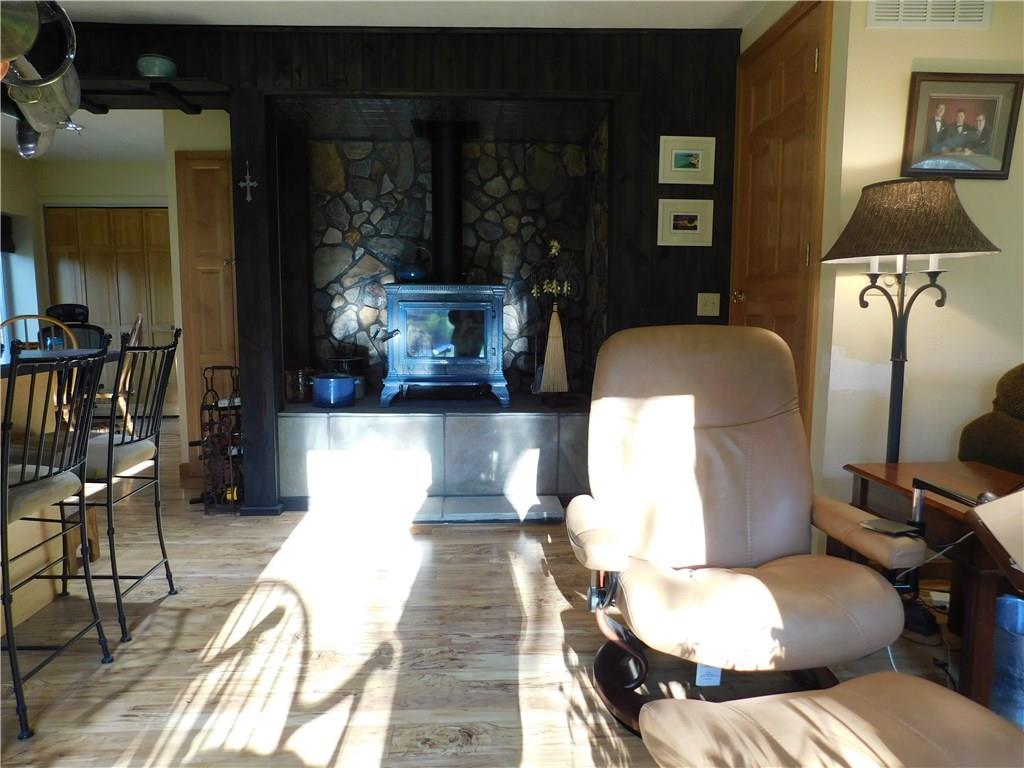 900 Methodist Road Greenville, PA 16125 - Photo 13 of 21 NEW STONE WALL WITH WOOD BURNER