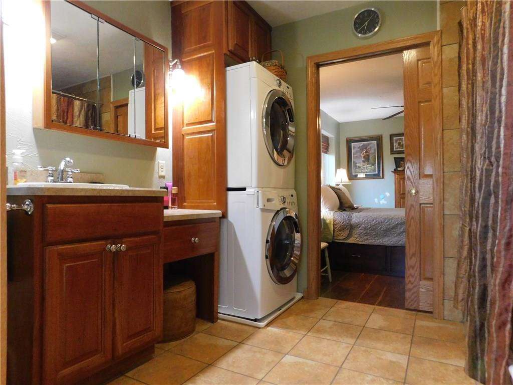 900 Methodist Road Greenville, PA 16125 - Photo 15 of 21 FULL BATH WITH TILE FLOORING, JET TUB WITH WATER LIGHTING DISPLAY, WASHER DRYER