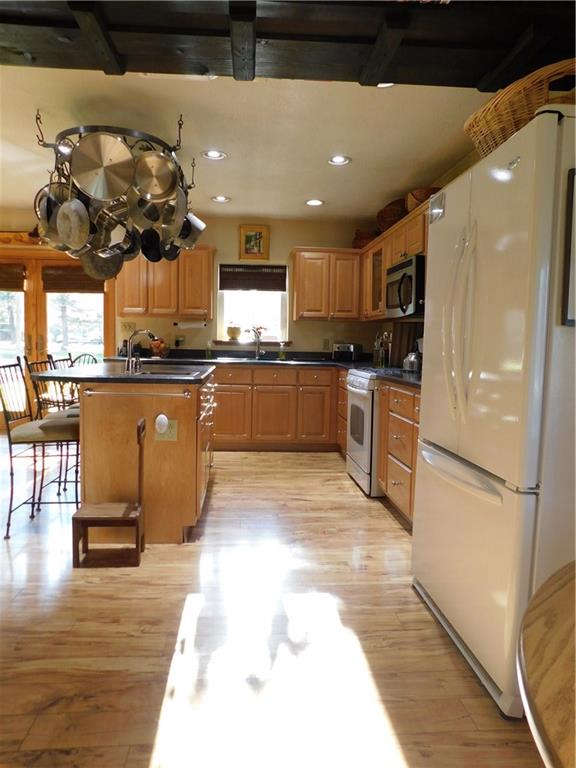 900 Methodist Road Greenville, PA 16125 - Photo 7 of 21 NEWER MAPLE KITCHEN WITH CUSTOM POT RACK, L.E.D. LIGHTING, ISLAND AND APPLIANCE PACKAGE