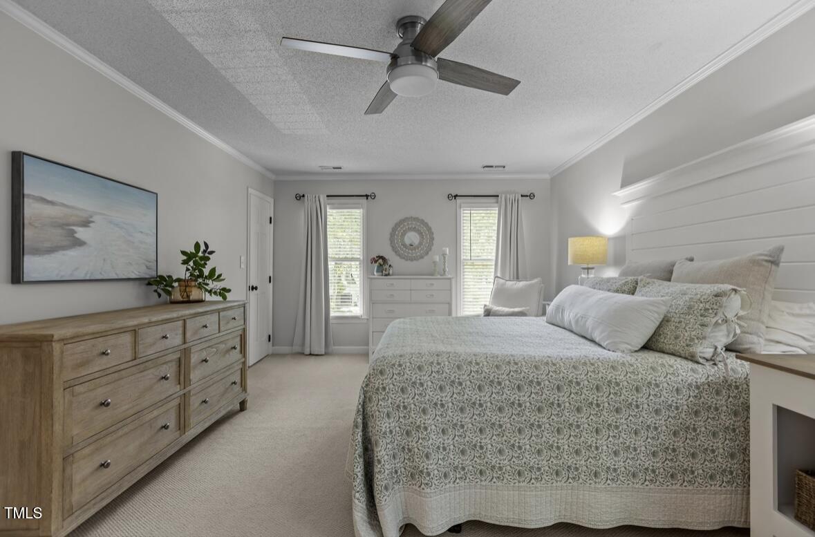 7517 Chippenham Court Raleigh, NC 27613 - Photo 23 of 43 Primary Headboard and tables can convey