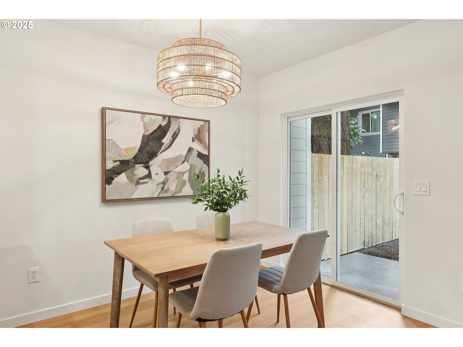 912 Southeast 193rd Avenue Portland, OR 97233 - Photo 14 of 28 a dining room with furniture and chandelier