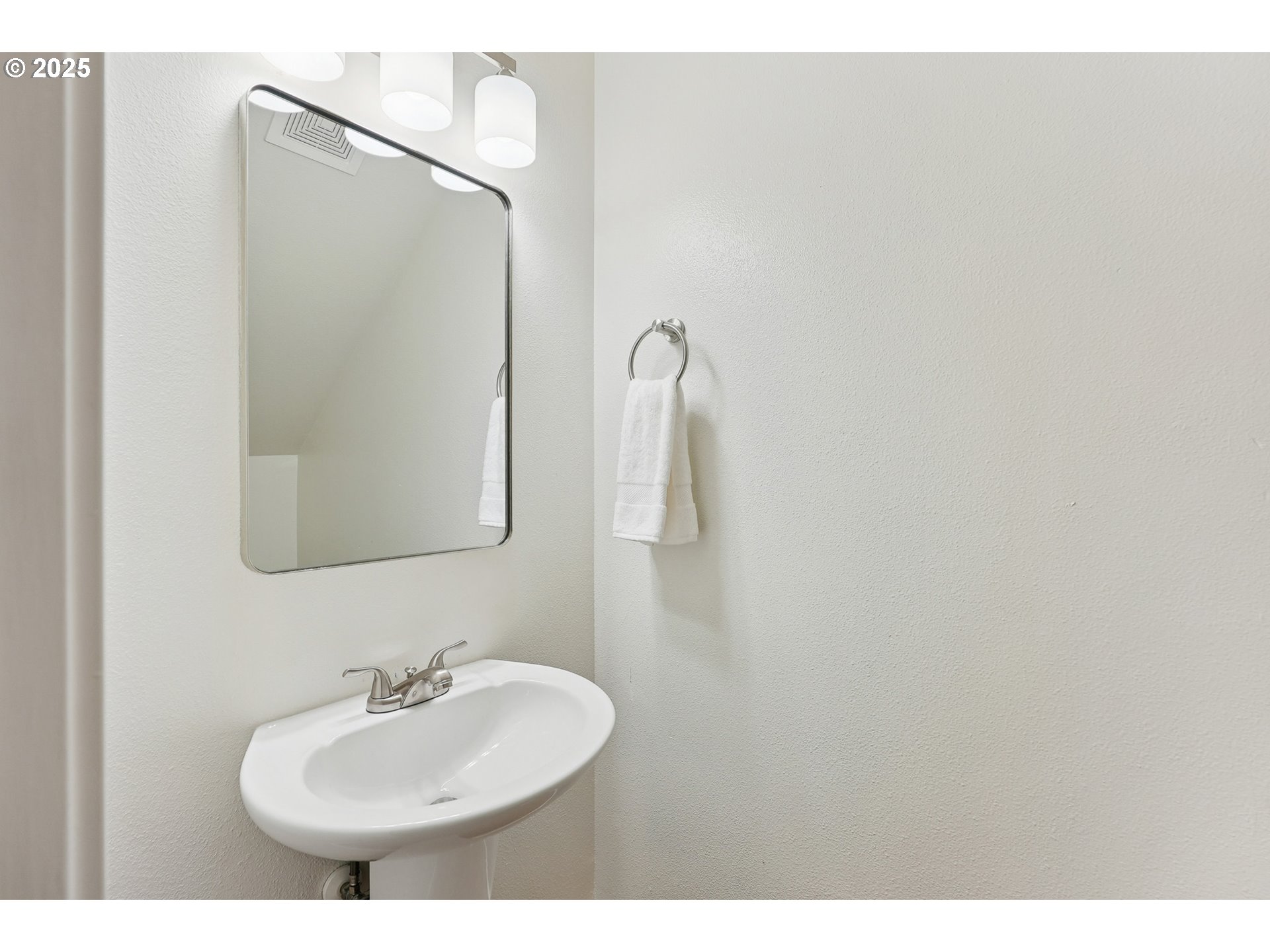 912 Southeast 193rd Avenue Portland, OR 97233 - Photo 16 of 28 a bathroom with a sink and a mirror