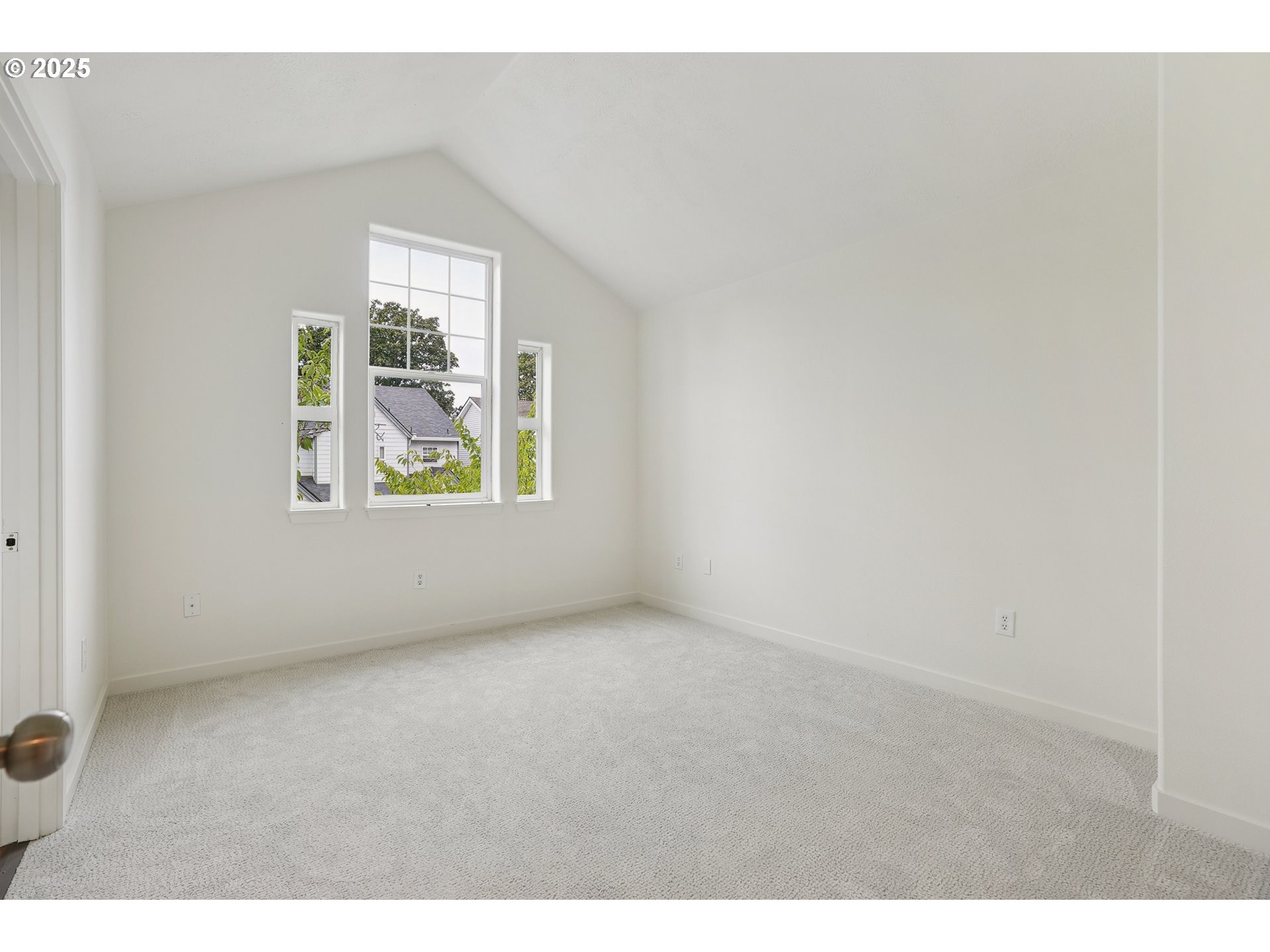 912 Southeast 193rd Avenue Portland, OR 97233 - Photo 17 of 28 a view of an empty room with a window
