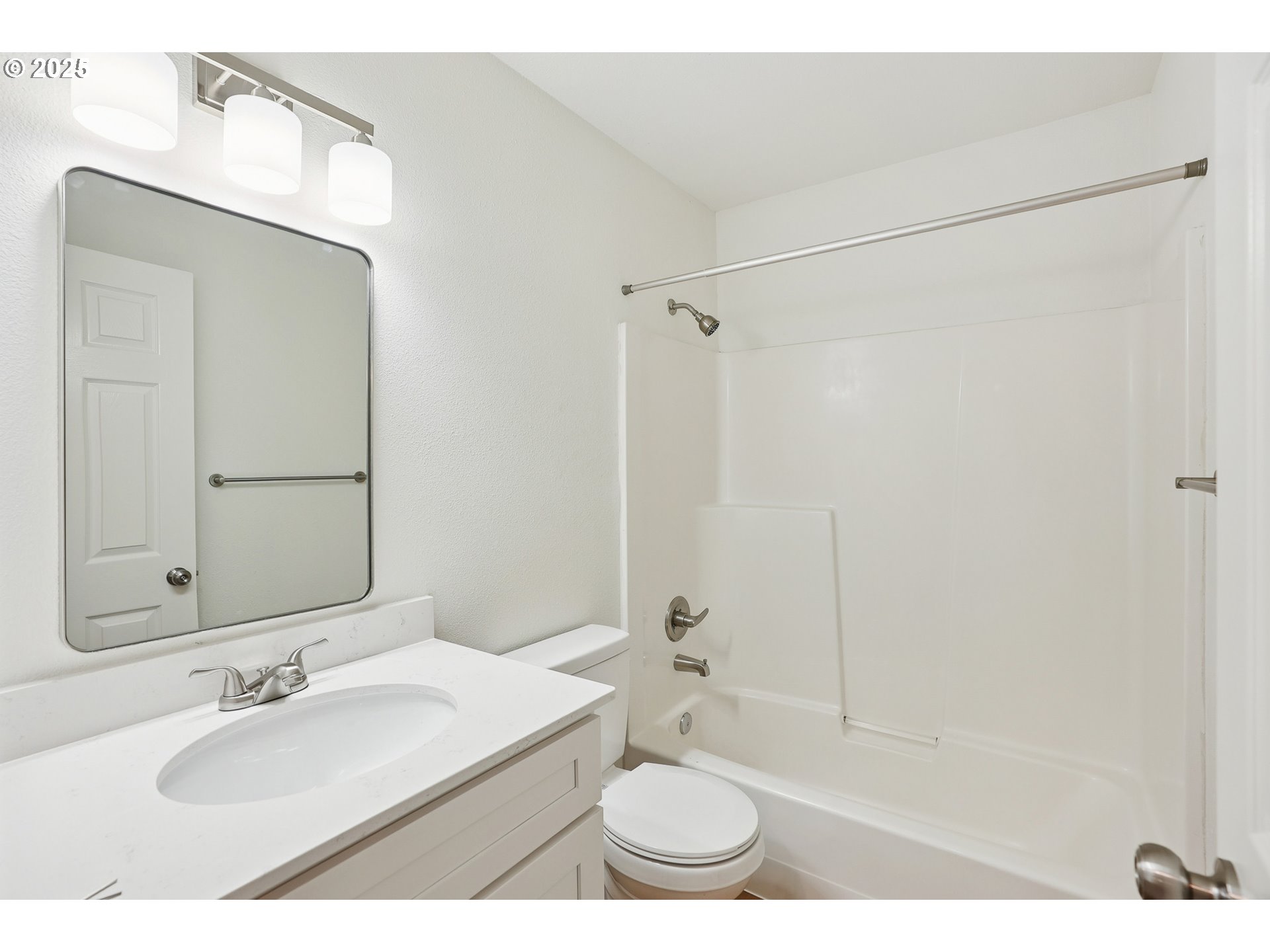 912 Southeast 193rd Avenue Portland, OR 97233 - Photo 22 of 28 a bathroom with a sink a toilet and shower