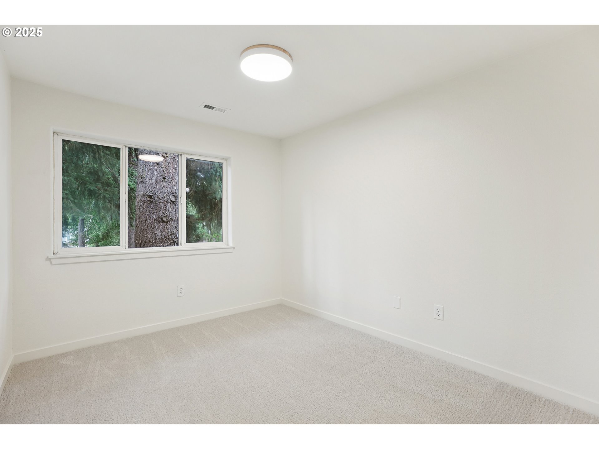 912 Southeast 193rd Avenue Portland, OR 97233 - Photo 23 of 28 a view of an empty room with a window