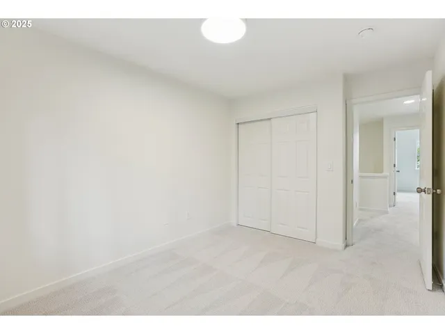 a bathroom with a sink toilet a mirror and shower