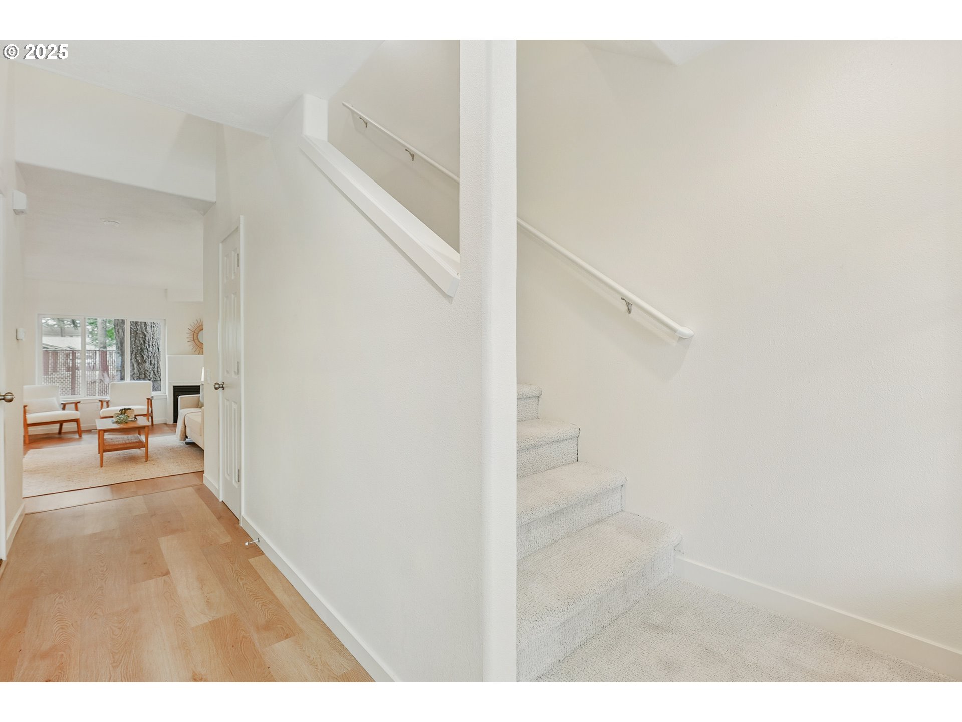 912 Southeast 193rd Avenue Portland, OR 97233 - Photo 4 of 28 a view of a living room with a wooden floor