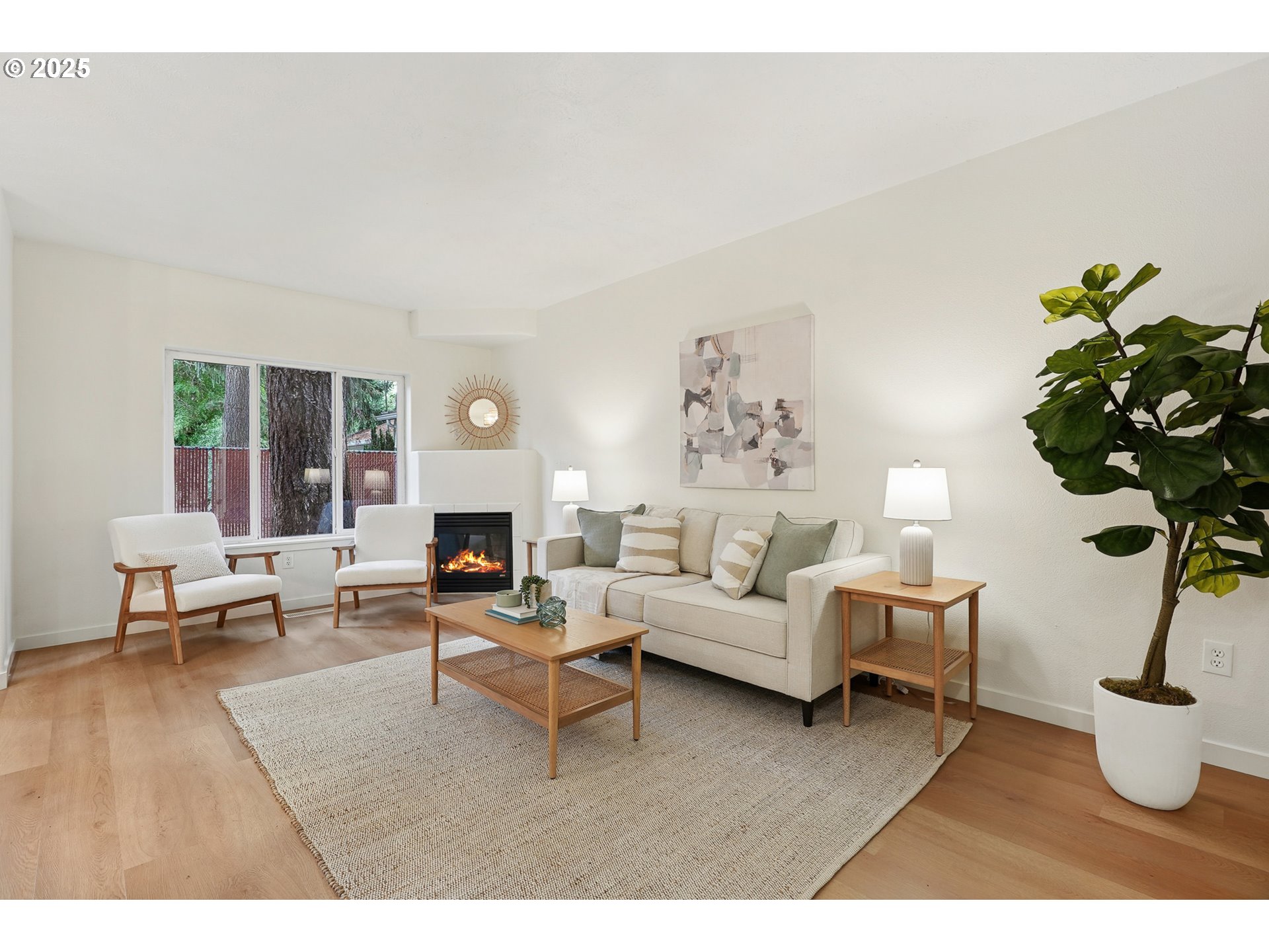 912 Southeast 193rd Avenue Portland, OR 97233 - Photo 8 of 28 a living room with furniture and a fireplace