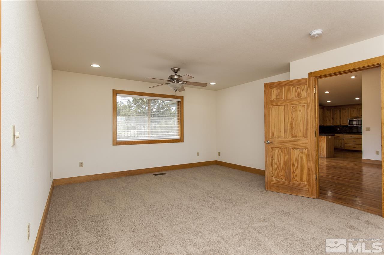 505 Space Test Road Reno, NV 89510 - Photo 19 of 25 an empty room with closet and windows
