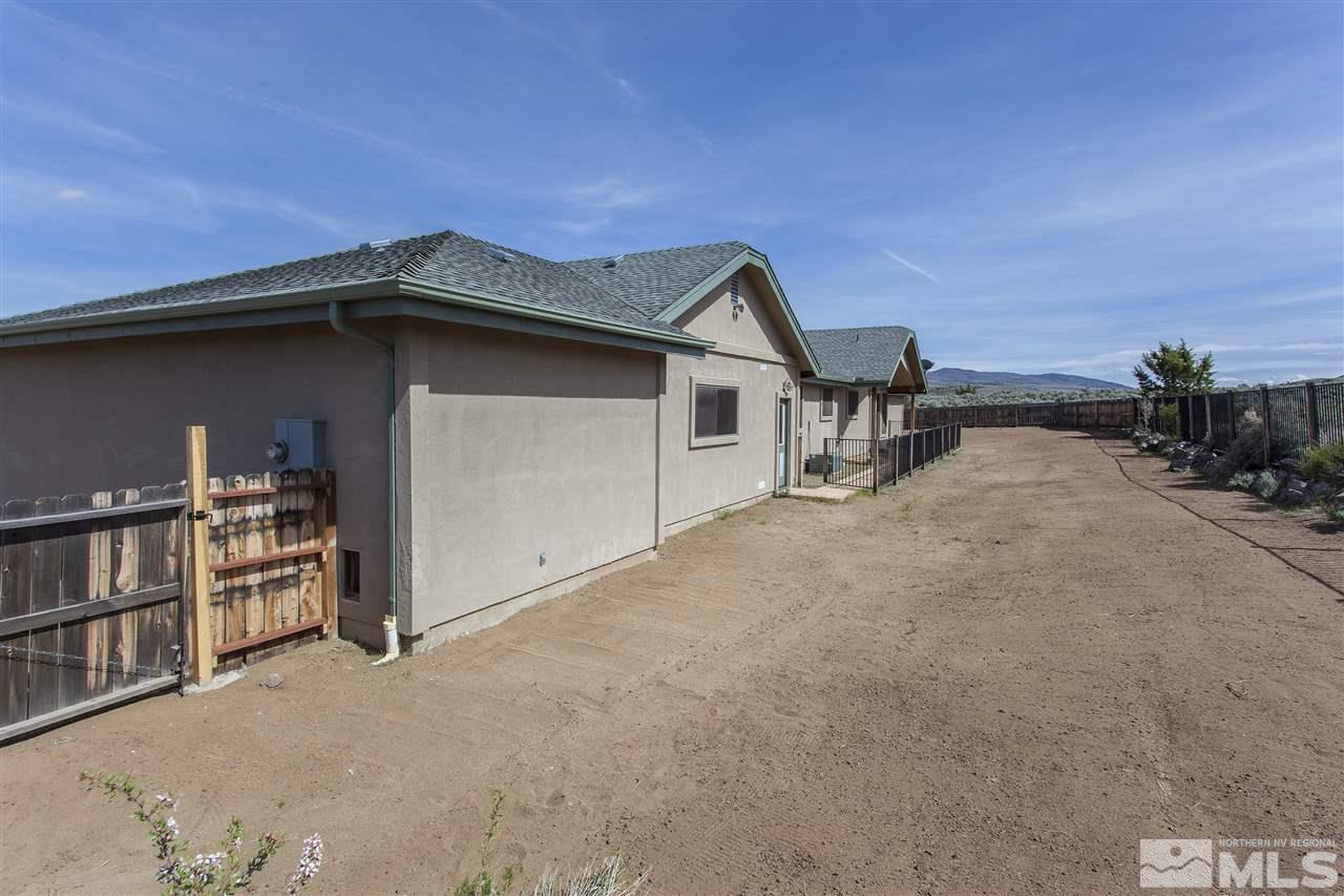 505 Space Test Road Reno, NV 89510 - Photo 5 of 25 a house with trees in the background