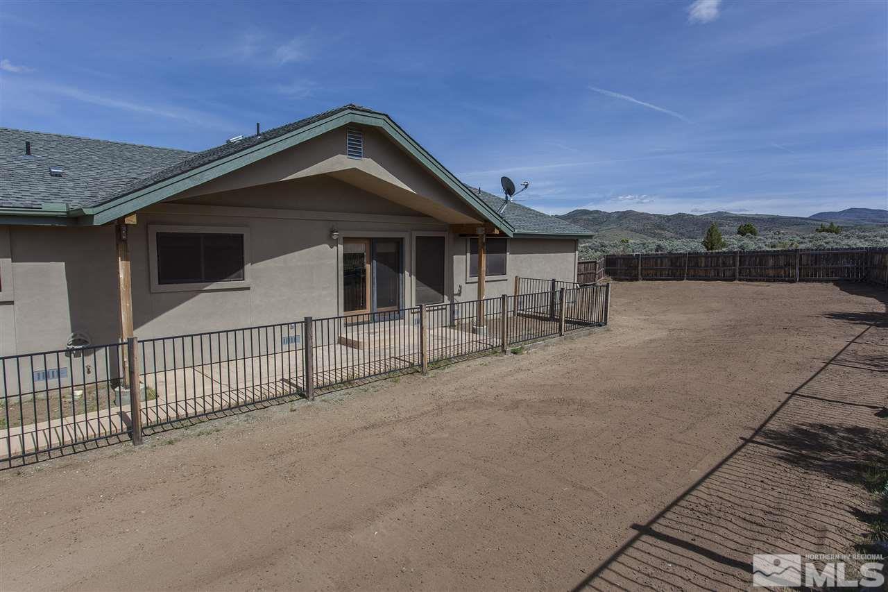 505 Space Test Road Reno, NV 89510 - Photo 6 of 25 a view of a house with a yard