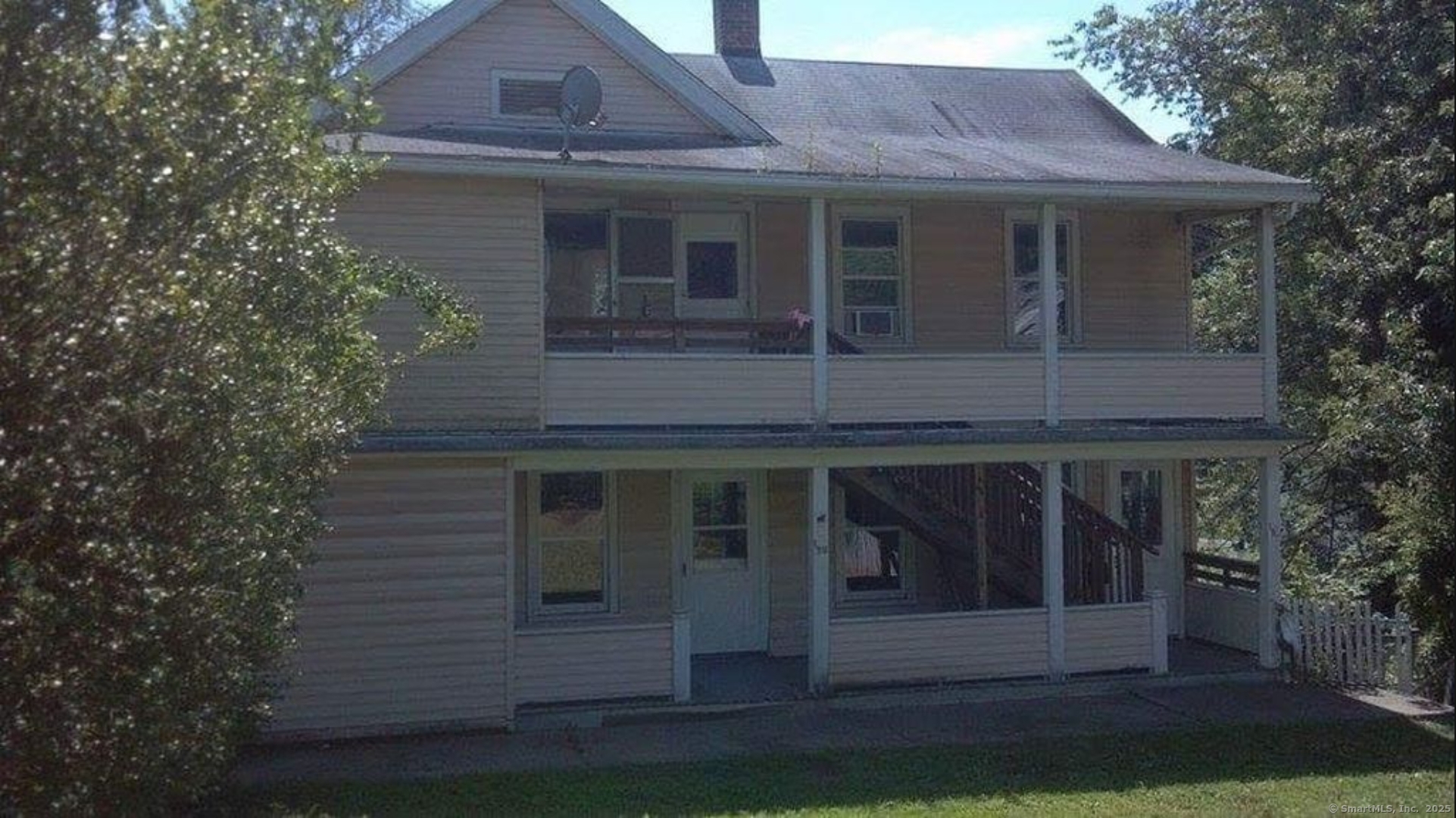 196 Echo Lake Road Watertown, CT 06795 - Photo 1 of 1 a front view of a house with a yard