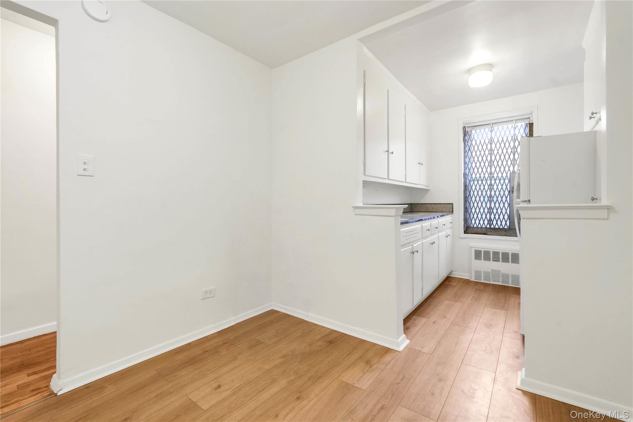 110-15 71st Road, Unit 6J Queens, NY 11375 - Photo 5 of 23 a view of kitchen with wooden floor