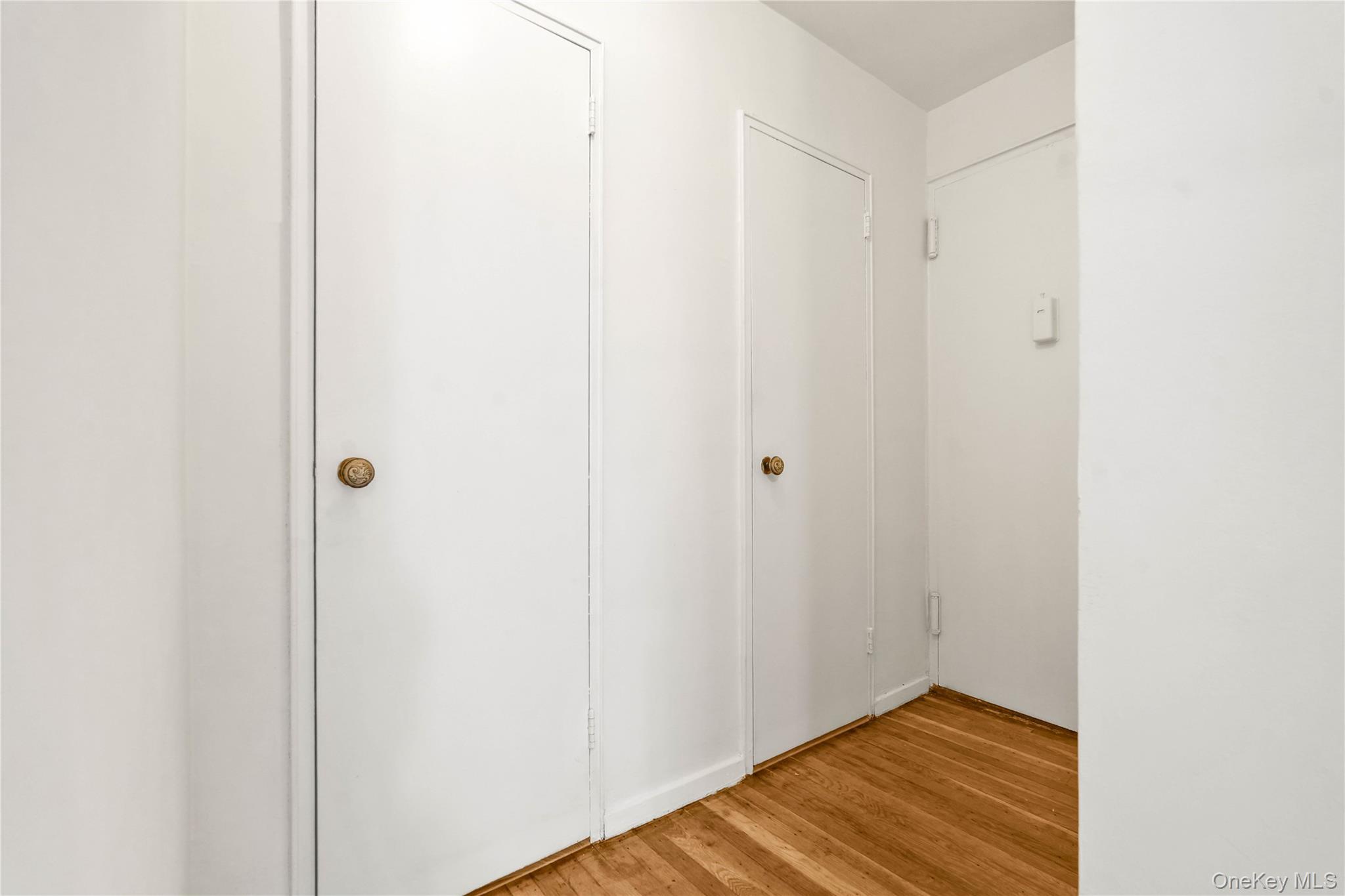 110-15 71st Road, Unit 6J Queens, NY 11375 - Photo 9 of 23 a view of a room with wooden floor