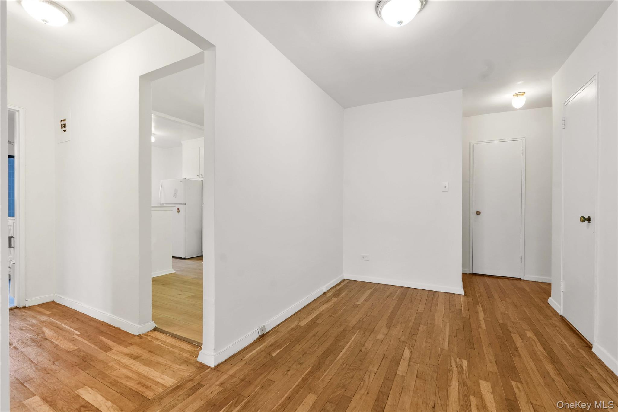 110-15 71st Road, Unit 6J Queens, NY 11375 - Photo 10 of 23 a view of a room with wooden floor