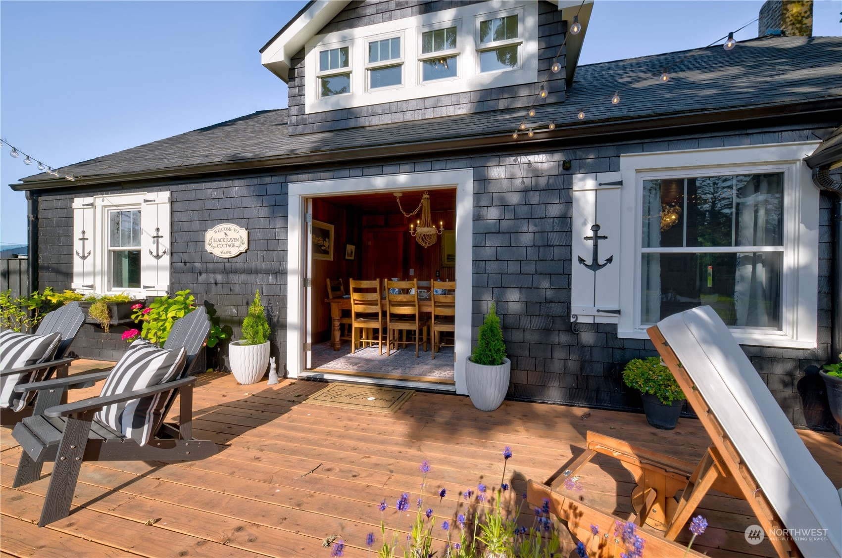 4202 L Place Seaview, WA 98644 - Photo 29 of 39 a backyard of a house with seating space