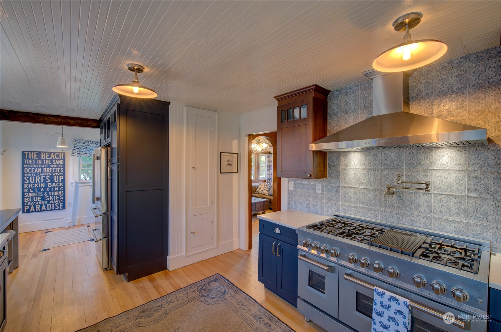 4202 L Place Seaview, WA 98644 - Photo 9 of 39 a kitchen with a stove and a refrigerator
