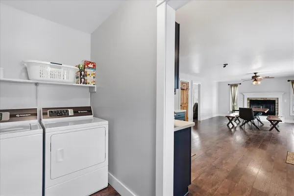 a view of livingroom with washer and dryer