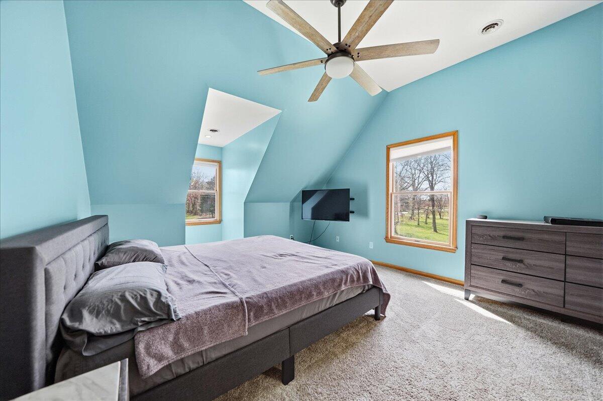 9642 West 1100th Street North Demotte, IN 46310 - Photo 22 of 37 a bedroom with a bed and a window