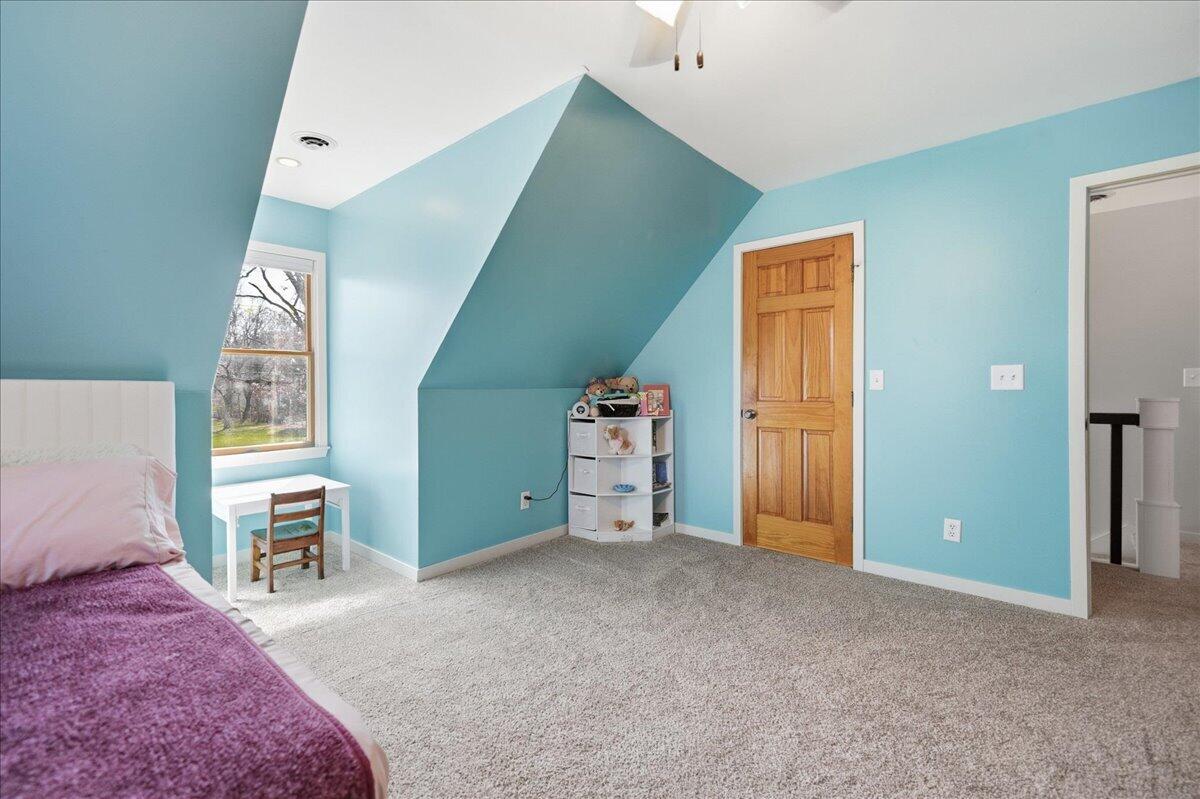 9642 West 1100th Street North Demotte, IN 46310 - Photo 23 of 37 a bedroom with a bed and a cabinets