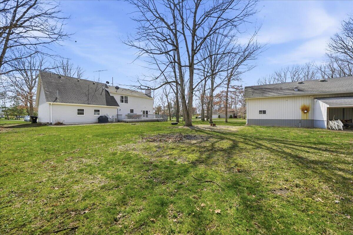 9642 West 1100th Street North Demotte, IN 46310 - Photo 27 of 37 a house view with a sitting space and garden