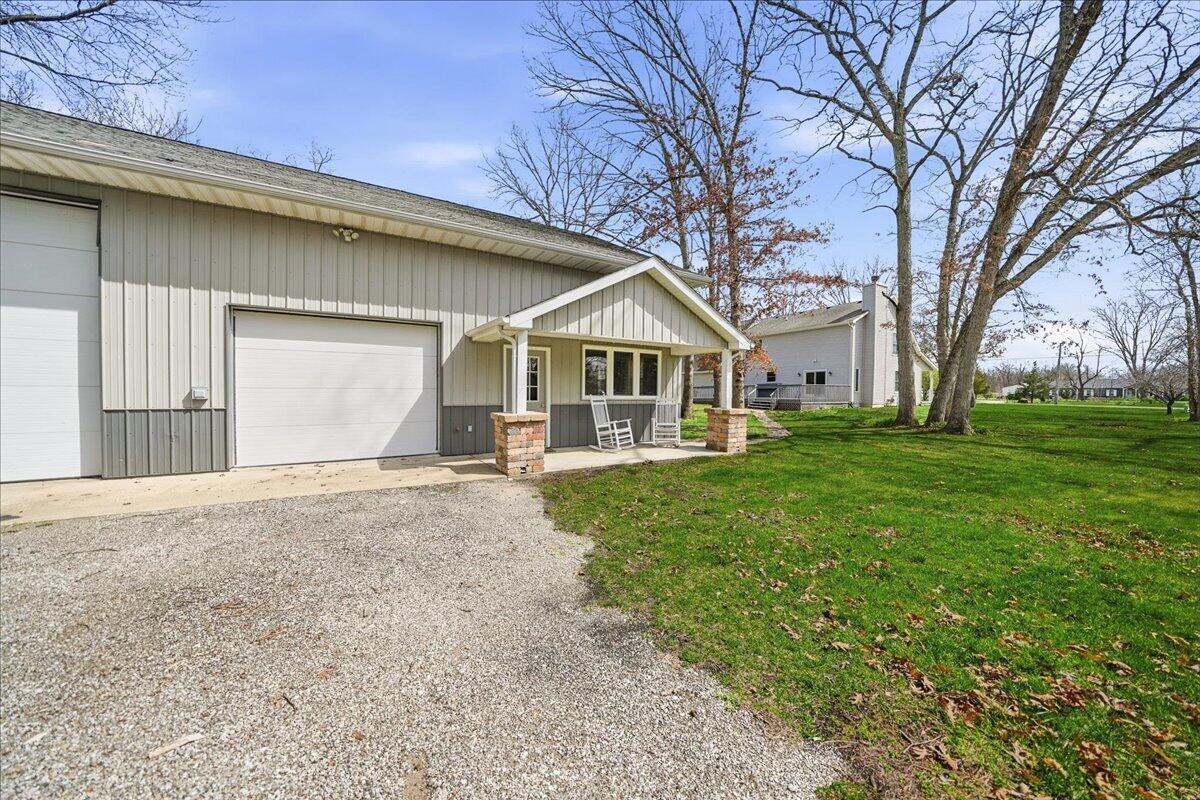 9642 West 1100th Street North Demotte, IN 46310 - Photo 29 of 37 a front view of a house with yard and green space