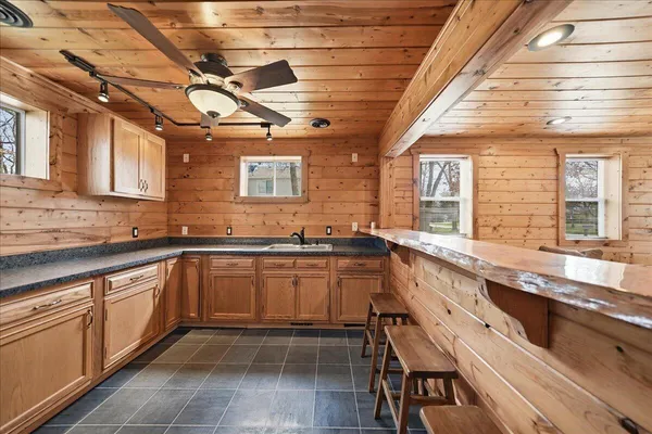 a bathroom with a toilet and a sink