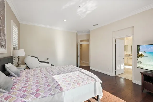 a spacious bathroom with a granite countertop sink mirror and cabinets
