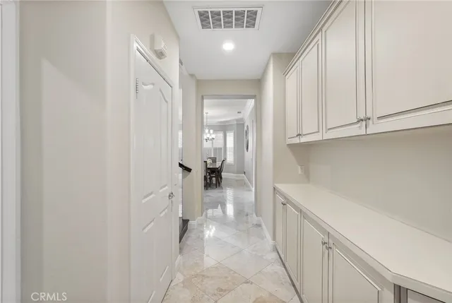 a living room with furniture wooden floor and a fireplace
