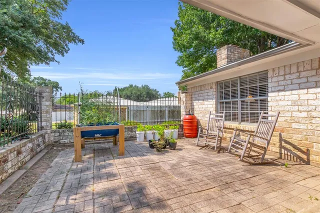 a view of a two chairs in the roof deck