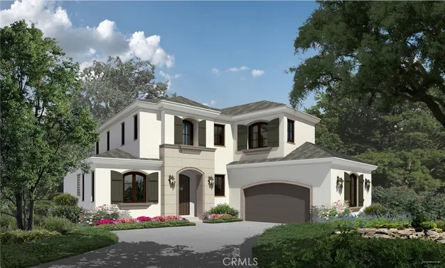 a front view of a house with plants and garden