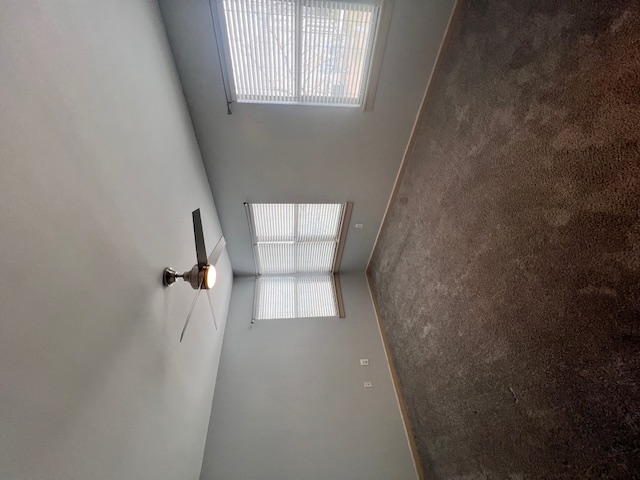 1201 Grove Boulevard, Unit 1901 Austin, TX 78741 - Photo 12 of 19 a view of empty room with windows