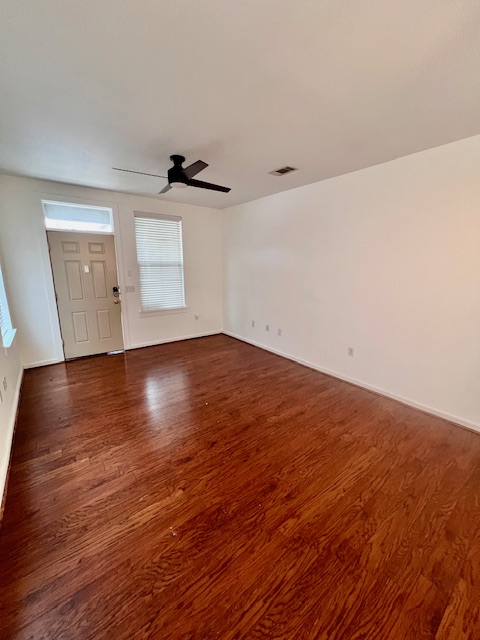 1201 Grove Boulevard, Unit 1901 Austin, TX 78741 - Photo 5 of 19 wooden floor in an empty room