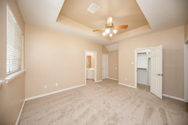 a view of backyard with green space