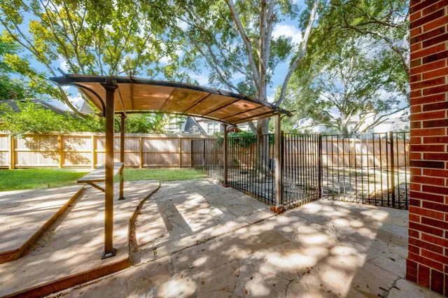 a front view of a house with a outdoor seating