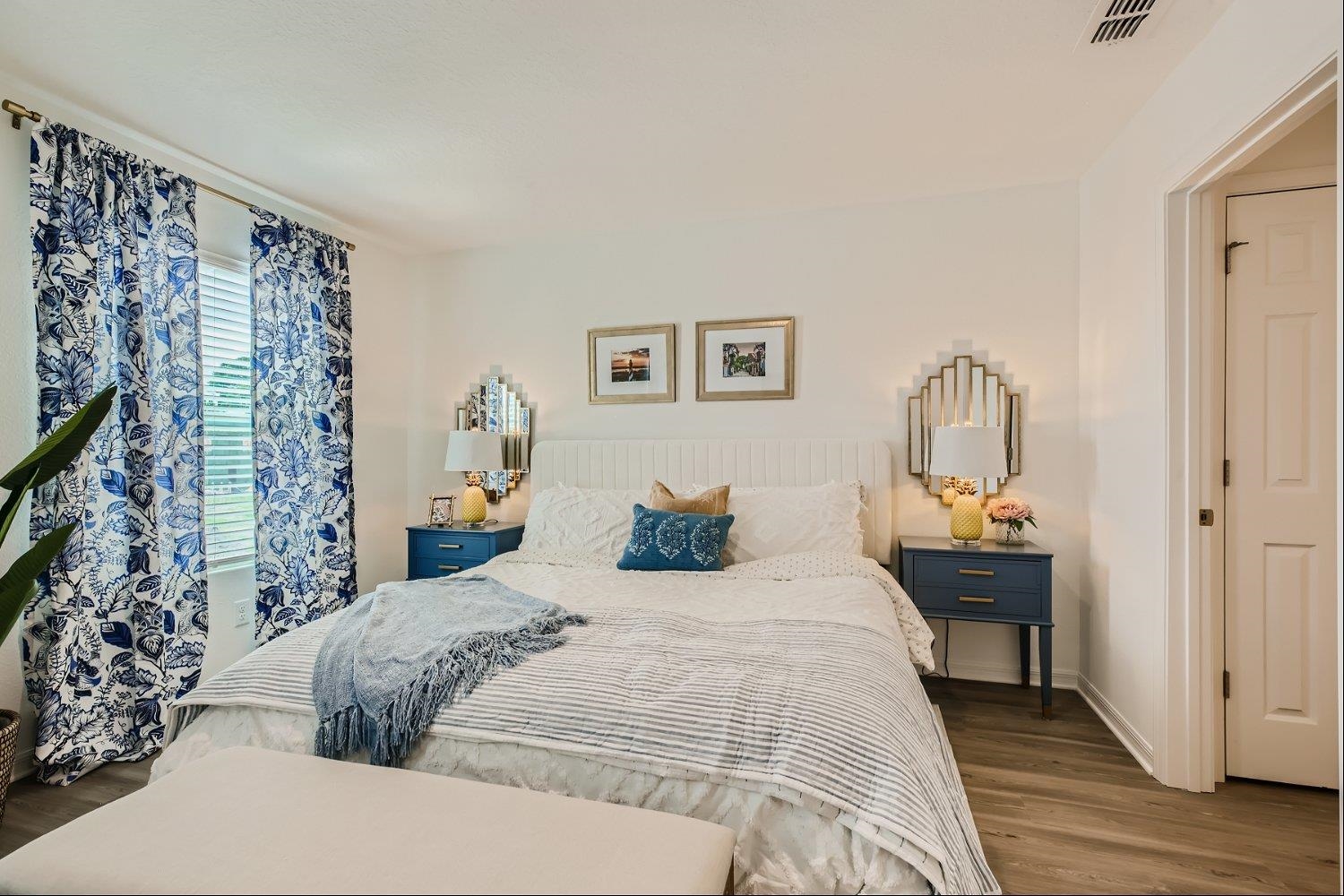 83 Pamplona Drive St. Augustine, FL 32086 - Photo 45 of 66 a bedroom with a bed and a chandelier